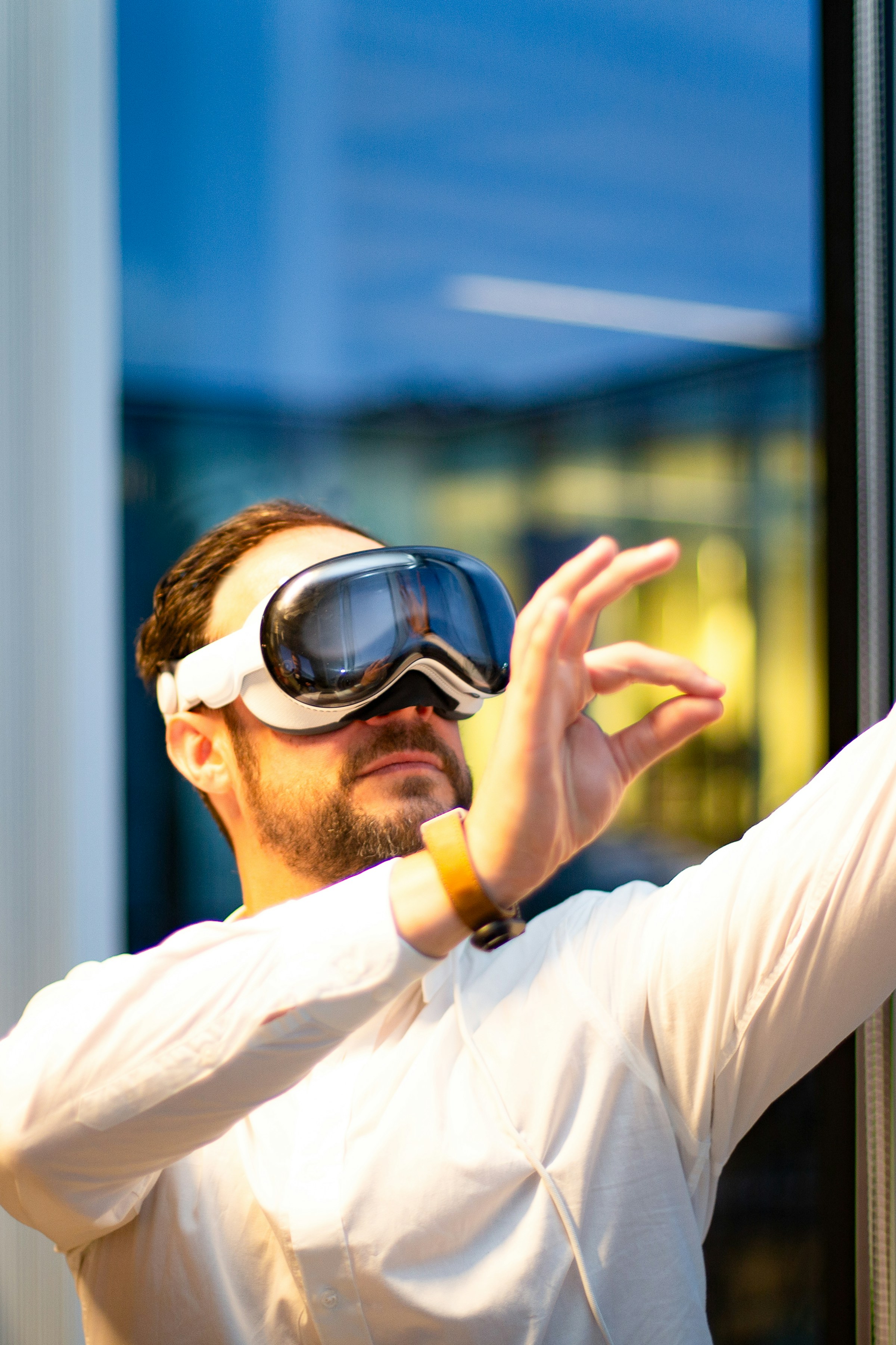 Creator wearing Apple Vision Pro in an office
